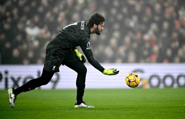 Liverpool Goalkeeper Alisson Becker rolling ball