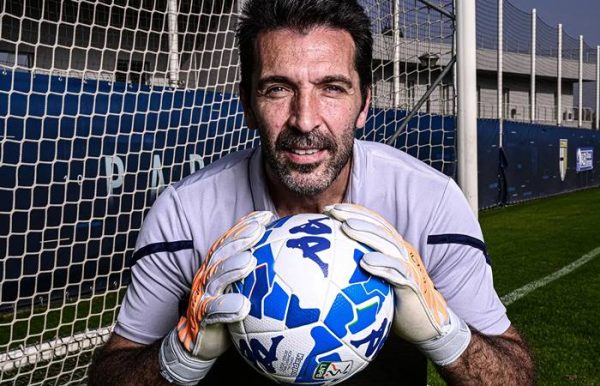 Gianluigi Buffon poses with a ball